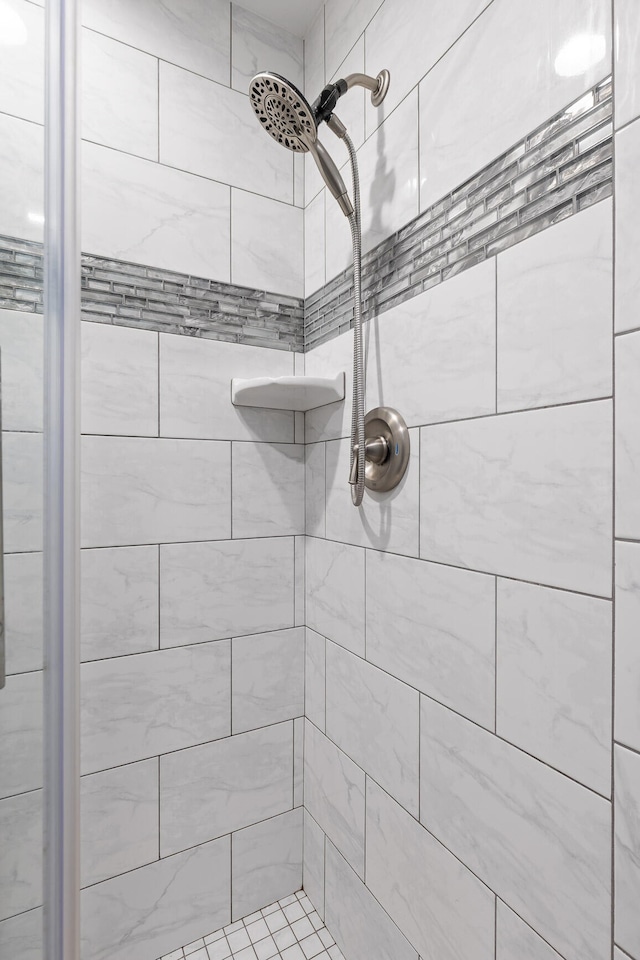 interior space with a tile shower