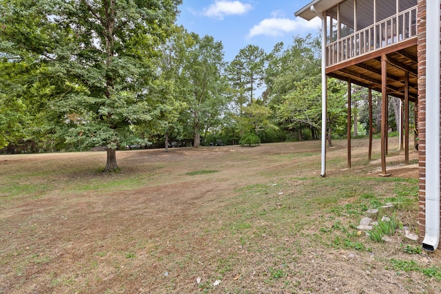 view of yard featuring a deck