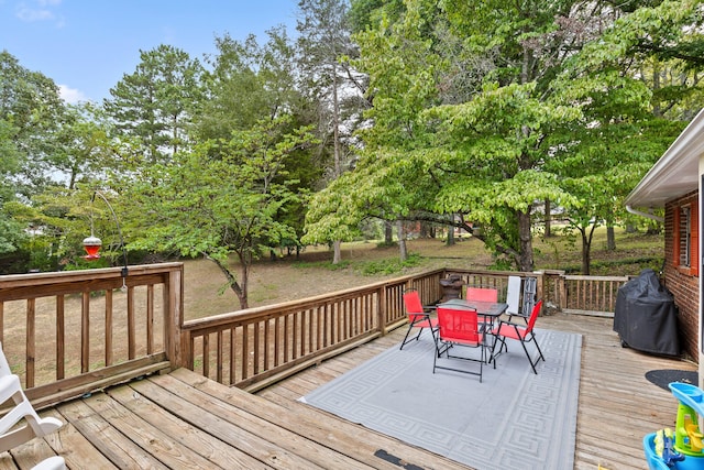 wooden terrace with grilling area