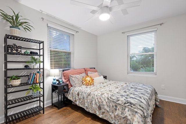 bedroom featuring ceiling fan and hardwood / wood-style flooring