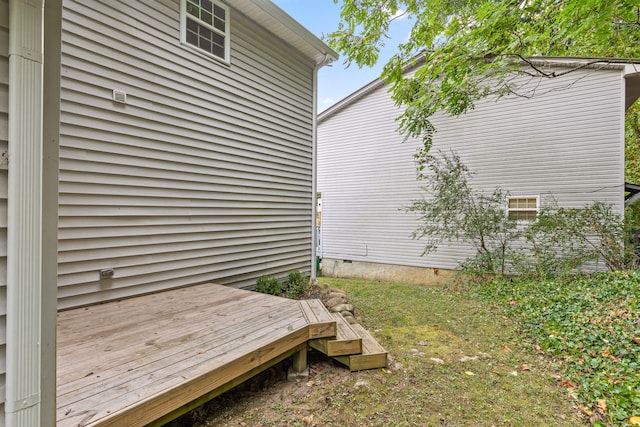 exterior space featuring a wooden deck