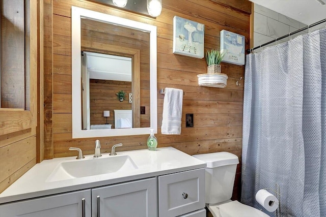 bathroom with curtained shower, wood walls, toilet, and vanity