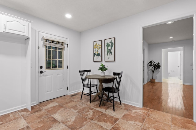 dining room with light hardwood / wood-style flooring