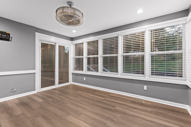 empty room featuring hardwood / wood-style floors