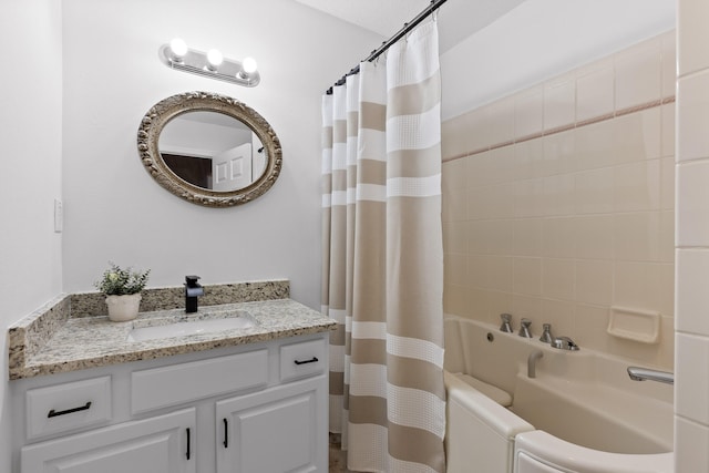 bathroom with shower / bathtub combination with curtain and vanity