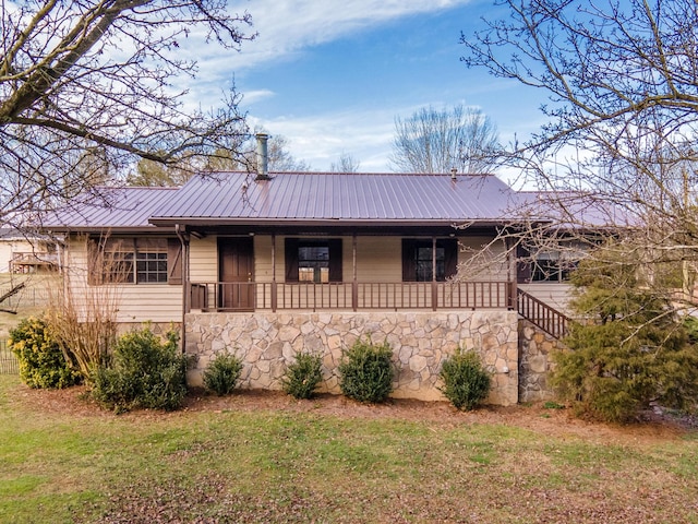 ranch-style home with a front lawn