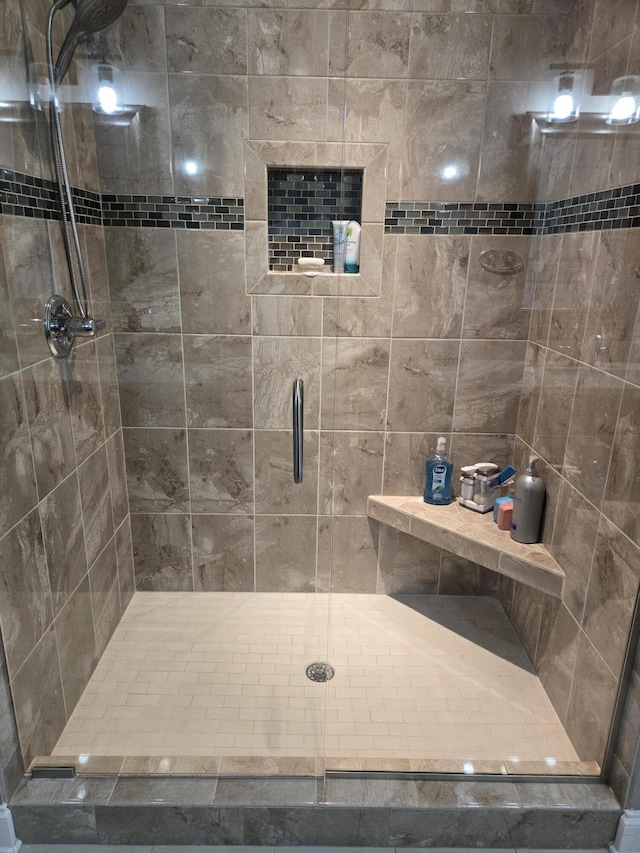 bathroom with an enclosed shower