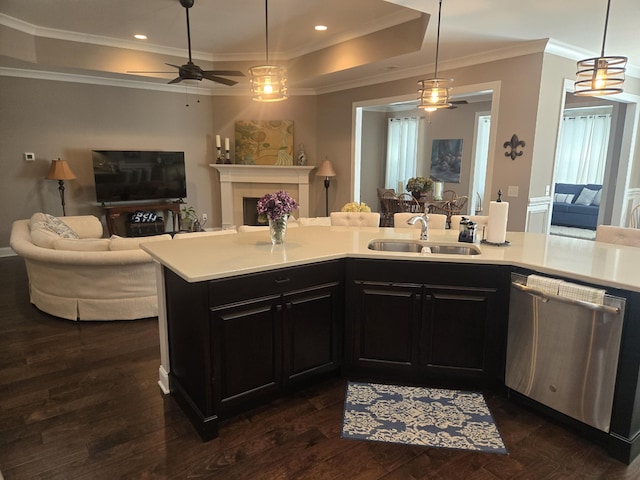 kitchen with ceiling fan, pendant lighting, sink, dark wood-type flooring, and dishwasher