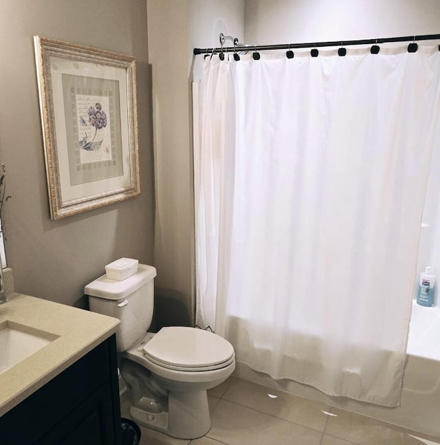 full bathroom with tile patterned flooring, vanity, toilet, and shower / bath combination with curtain