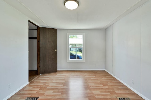 unfurnished bedroom featuring light hardwood / wood-style floors