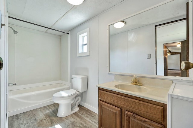 full bathroom with wood-type flooring, vanity, toilet, and shower / bath combination