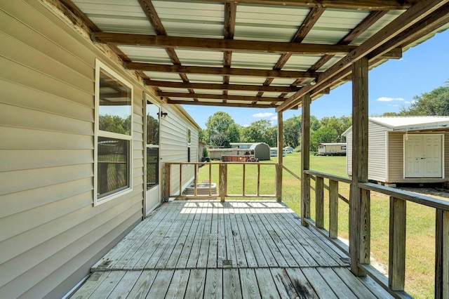 deck featuring a lawn