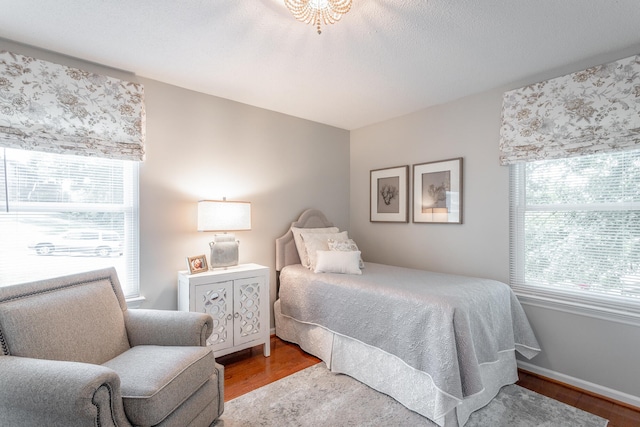 bedroom with light hardwood / wood-style flooring