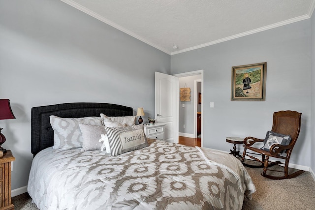 bedroom featuring ornamental molding, a textured ceiling, and carpet flooring