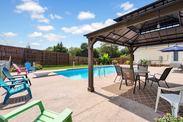 view of pool with a gazebo and a patio