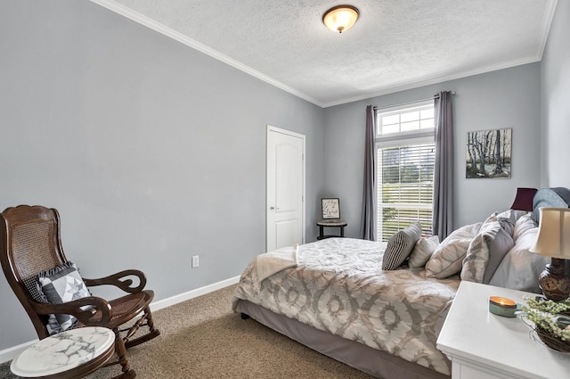 bedroom featuring a textured ceiling, ornamental molding, and carpet