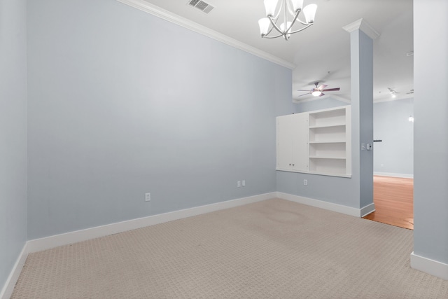 carpeted empty room with ceiling fan with notable chandelier and ornamental molding