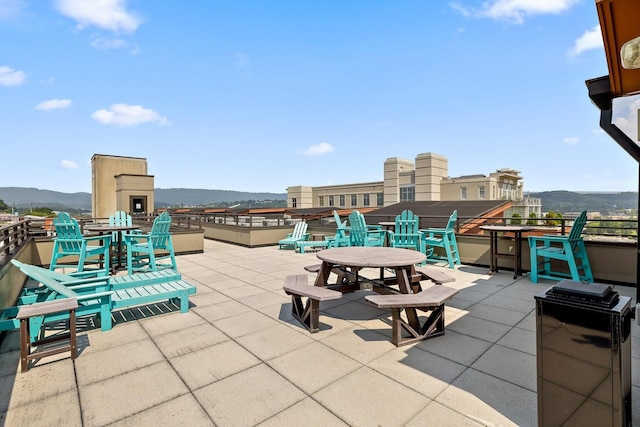 view of patio / terrace with a mountain view