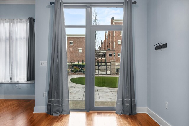 doorway to outside featuring hardwood / wood-style floors