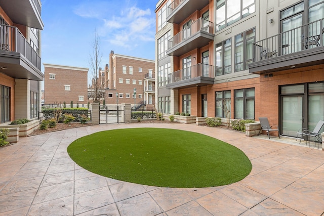 view of home's community featuring a patio area