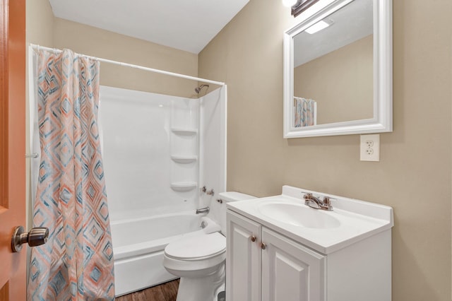 full bathroom with wood-type flooring, shower / bath combination with curtain, vanity, and toilet