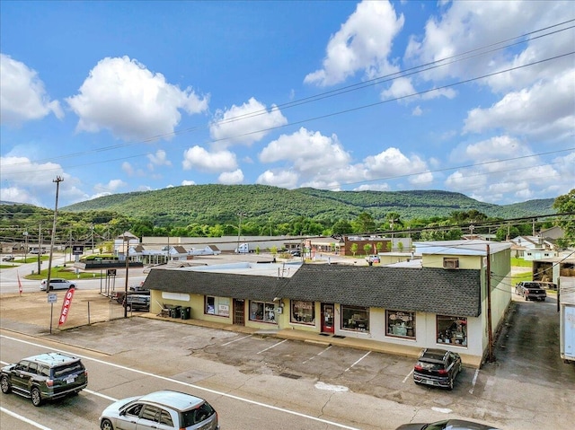 view of building exterior featuring a mountain view