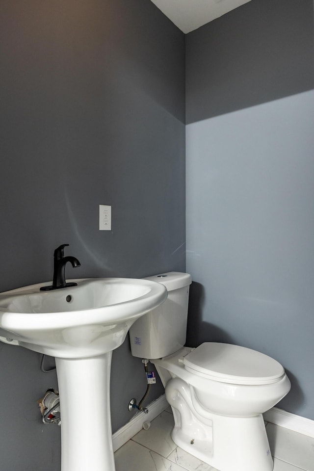 bathroom featuring toilet