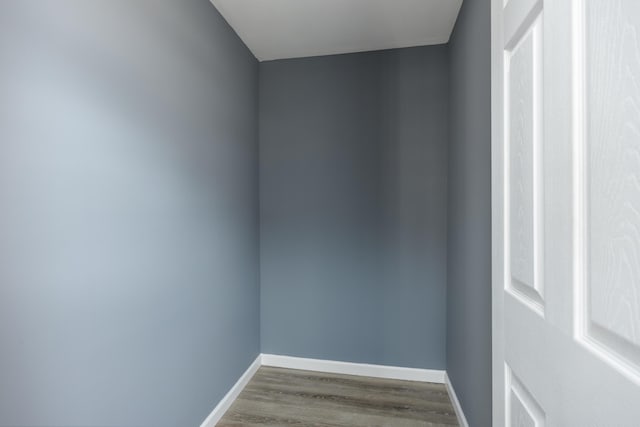 unfurnished room featuring hardwood / wood-style flooring