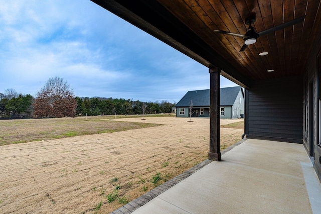 view of yard featuring ceiling fan