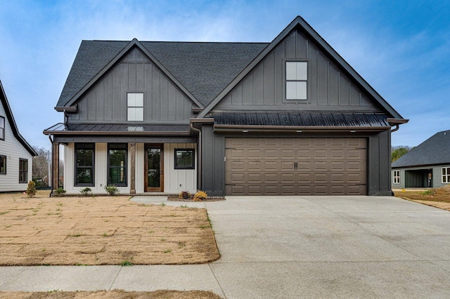 view of front of home featuring a porch and a garage