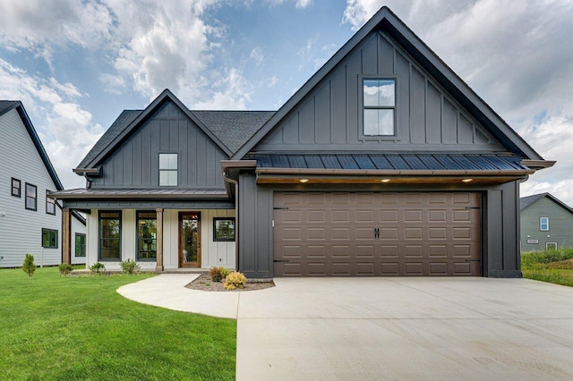 111 Arthur Ln, Cleveland, TN 37312 - modern inspired farmhouse featuring board and batten siding, driveway, a standing seam roof, and a front lawn