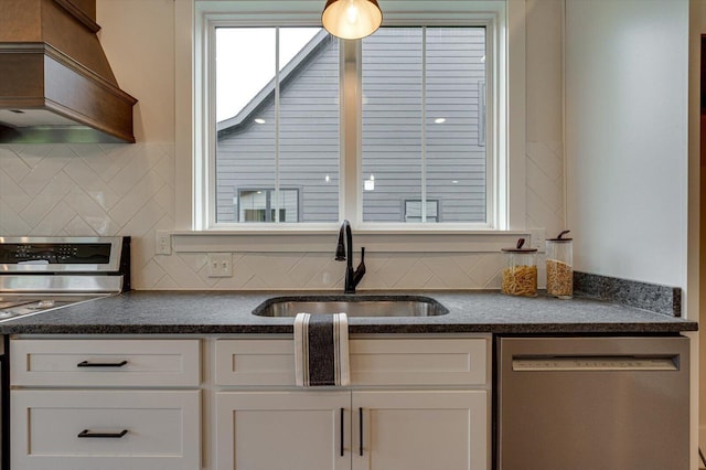 105 Arthur Ln, Cleveland, TN 37312 - kitchen featuring dishwasher, a sink, dark countertops, range, and custom range hood