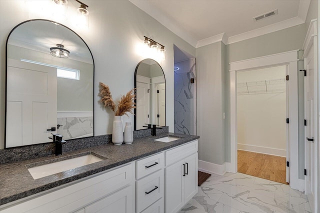 105 Arthur Ln, Cleveland, TN 37312 - full bath with double vanity, marble finish floors, a walk in closet, and ornamental molding