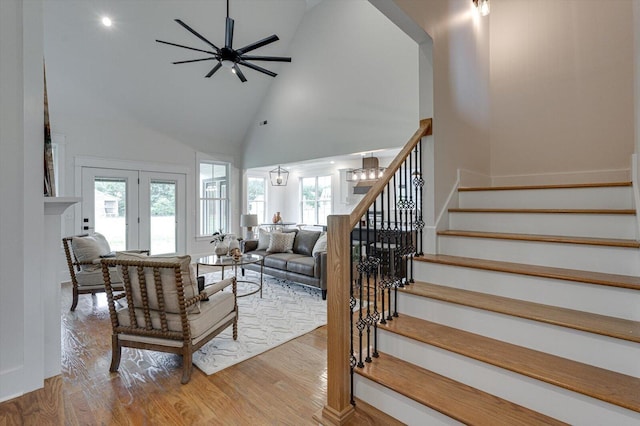 105 Arthur Ln, Cleveland, TN 37312 - living room with stairway, ceiling fan, high vaulted ceiling, wood finished floors, and a chandelier