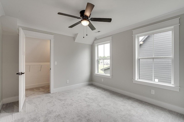 105 Arthur Ln, Cleveland, TN 37312 - unfurnished bedroom with carpet floors, baseboards, a ceiling fan, and a walk in closet