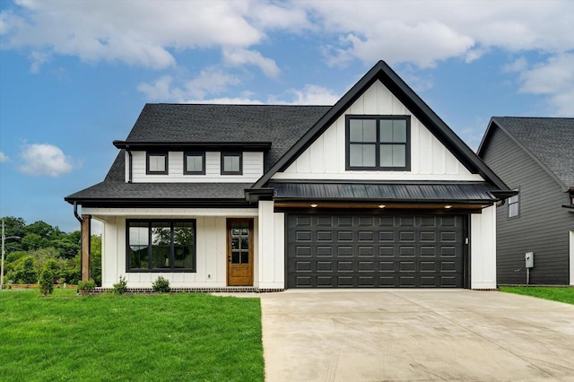 105 Arthur Ln, Cleveland, TN 37312 - modern inspired farmhouse with board and batten siding, driveway, a front yard, an attached garage, and a shingled roof