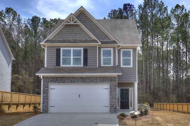 craftsman-style home with a garage