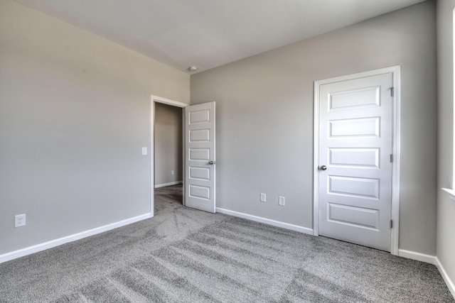 unfurnished bedroom featuring carpet floors