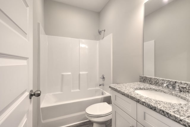 full bathroom featuring vanity, shower / bath combination, and toilet