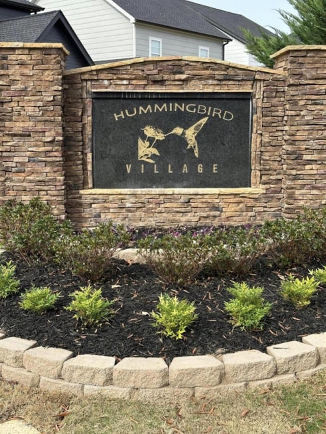 view of community sign