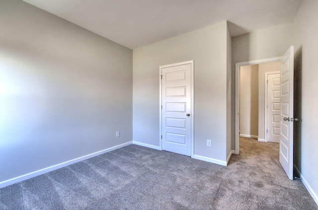 unfurnished bedroom with carpet flooring