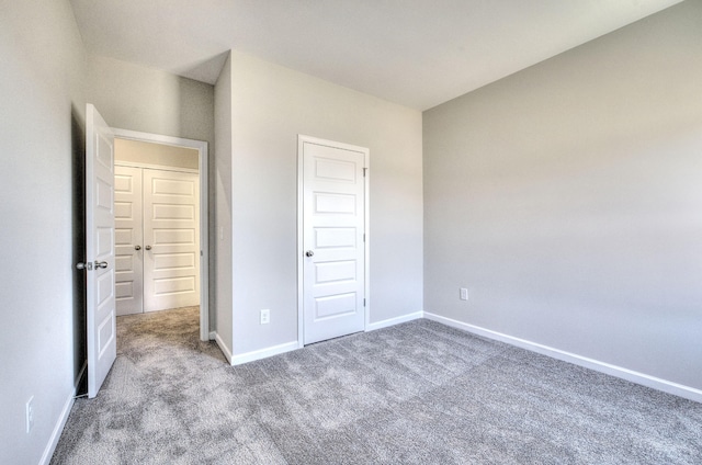 unfurnished bedroom featuring carpet floors