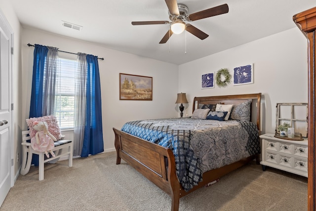 carpeted bedroom featuring ceiling fan