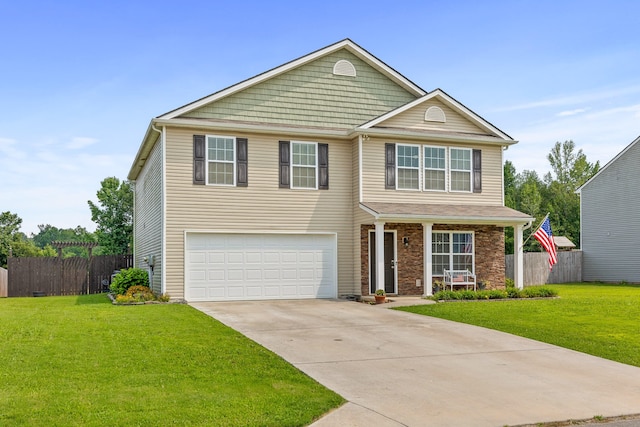 view of front of home featuring a garage and a front lawn