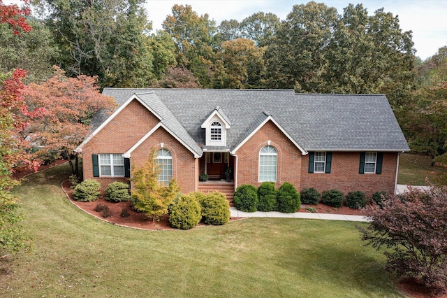 view of front of home with a front lawn