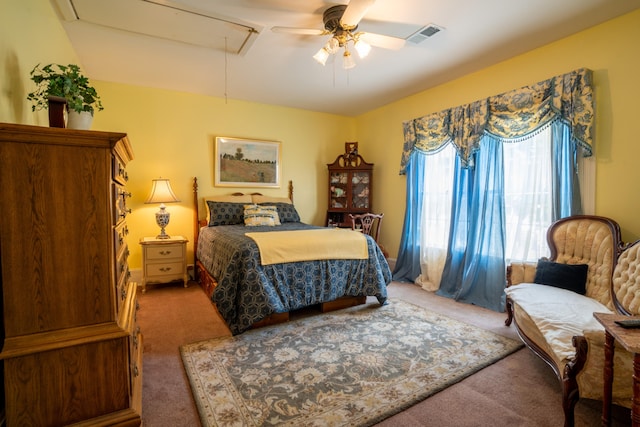 carpeted bedroom with ceiling fan