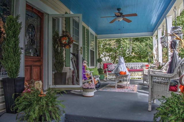 view of patio featuring ceiling fan