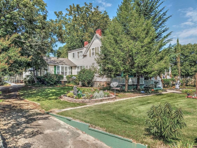 exterior space featuring a front lawn