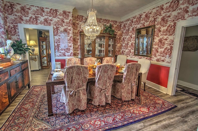 dining room featuring crown molding and wood-type flooring