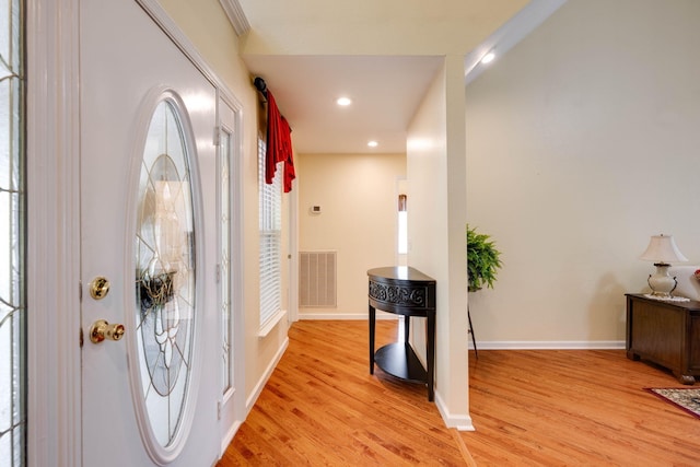 entrance foyer with light wood-type flooring